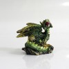 DRAGÃO COM CASTELO DECORATIVO EM RESINA REF: PW170027 DRAGÃO COM CASTELO DECORATIVO EM RESINA REF: PW170027