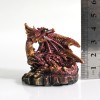 DRAGÃO COM CASTELO DECORATIVO EM RESINA REF: PW170027 DRAGÃO COM CASTELO DECORATIVO EM RESINA REF: PW170027