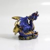 DRAGÃO COM CASTELO DECORATIVO EM RESINA REF: PW170027 DRAGÃO COM CASTELO DECORATIVO EM RESINA REF: PW170027