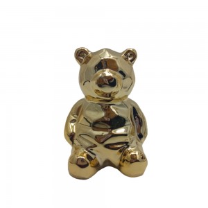 ENFEITE URSO DE CERAMICA DOURADO
